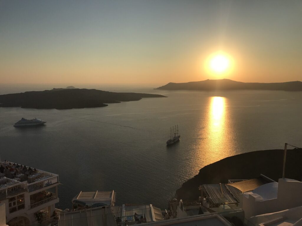 Fake Travel News - Sunset in Santorini, Greece